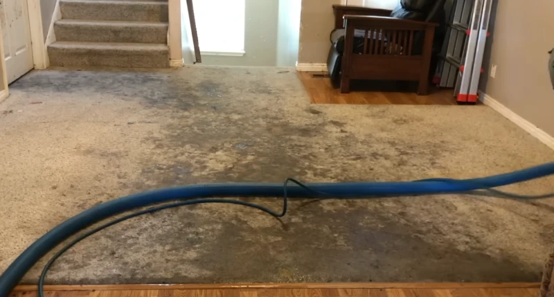 Wall to wall carpet with dark traffic lanes before cleaning
